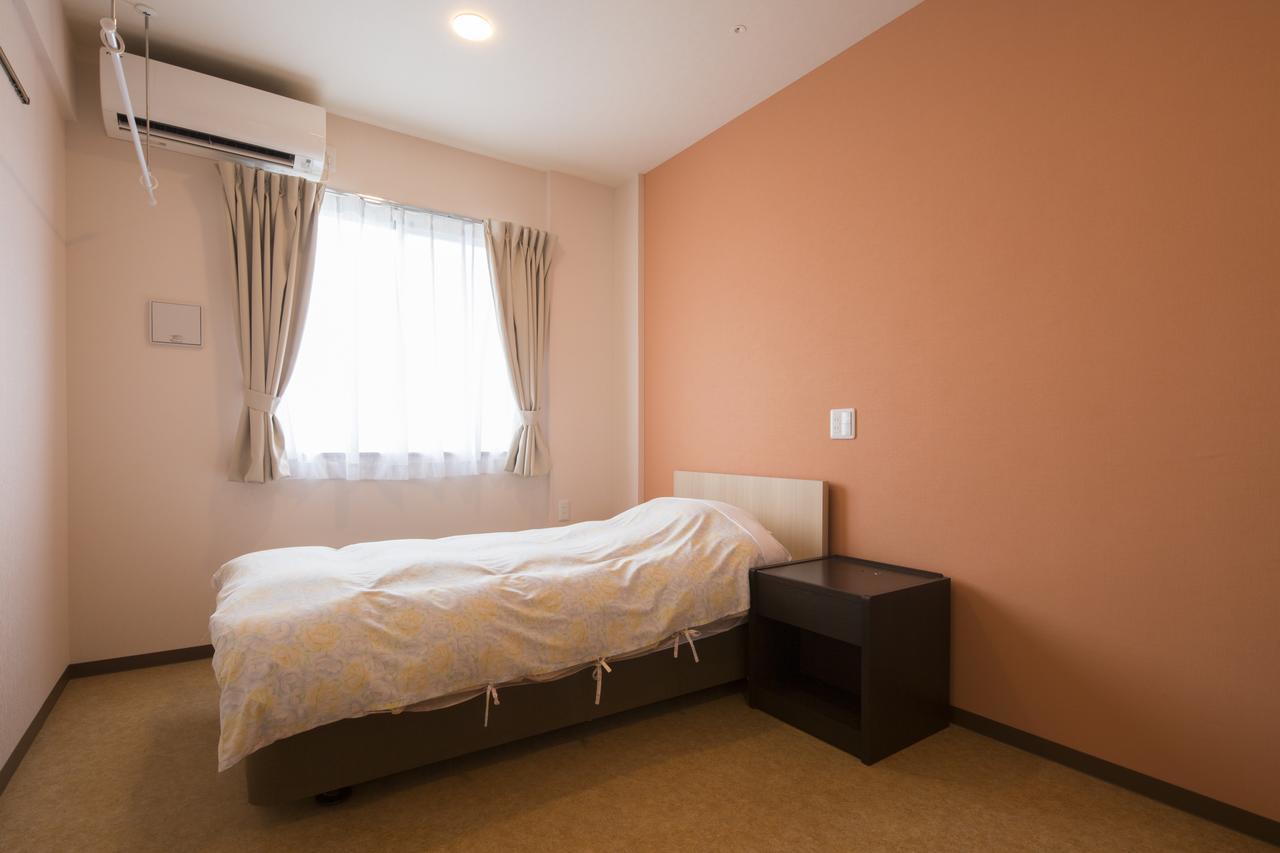 Hotel Asahi Grandeur Футю Экстерьер фото