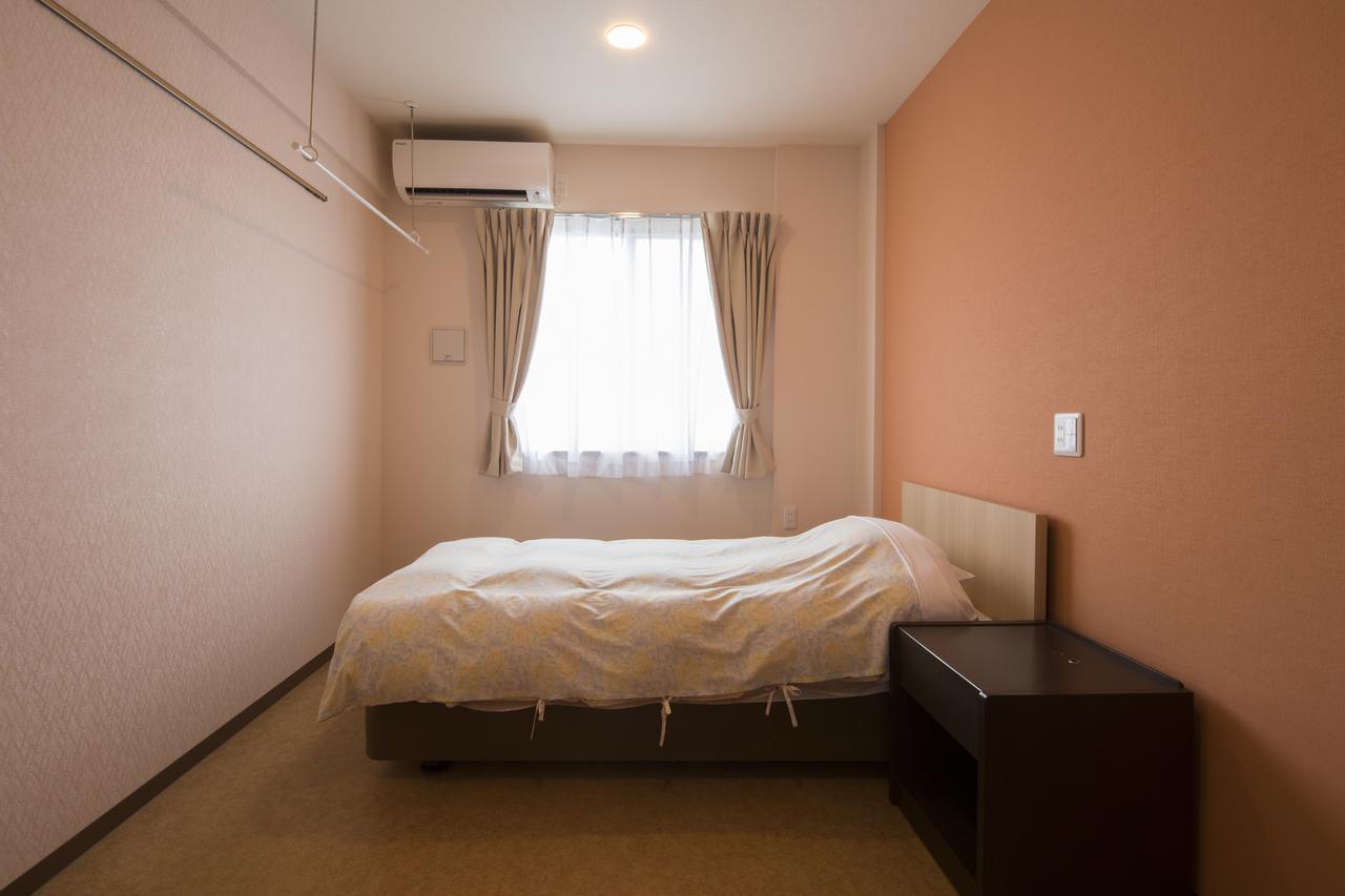Hotel Asahi Grandeur Футю Экстерьер фото